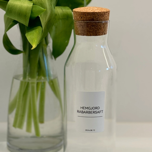 Etikett på glasflaska